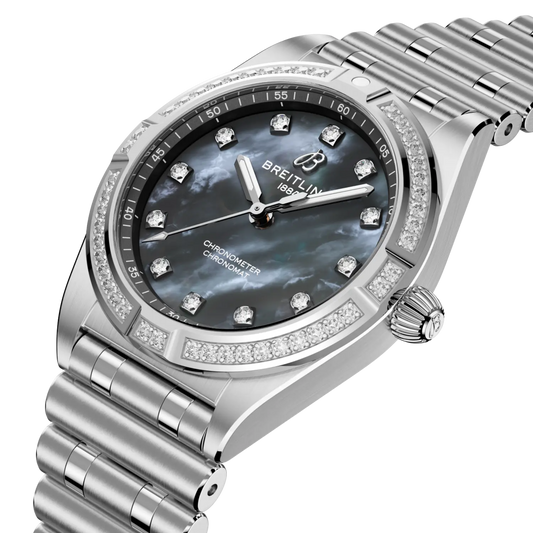 side view of Breitling Chronomat Automatic showing steel case crown and diamond set bezel detail