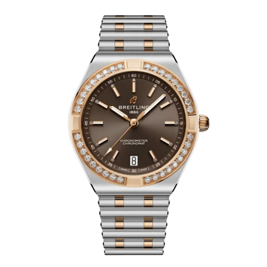 Breitling Chronomat watch with a brown dial, diamond-set bezel, and two-tone bracelet.