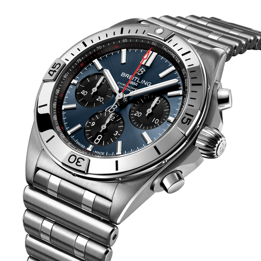 side view of Breitling Chronomat chronograph showing steel case pushers crown and tachymeter bezel detail