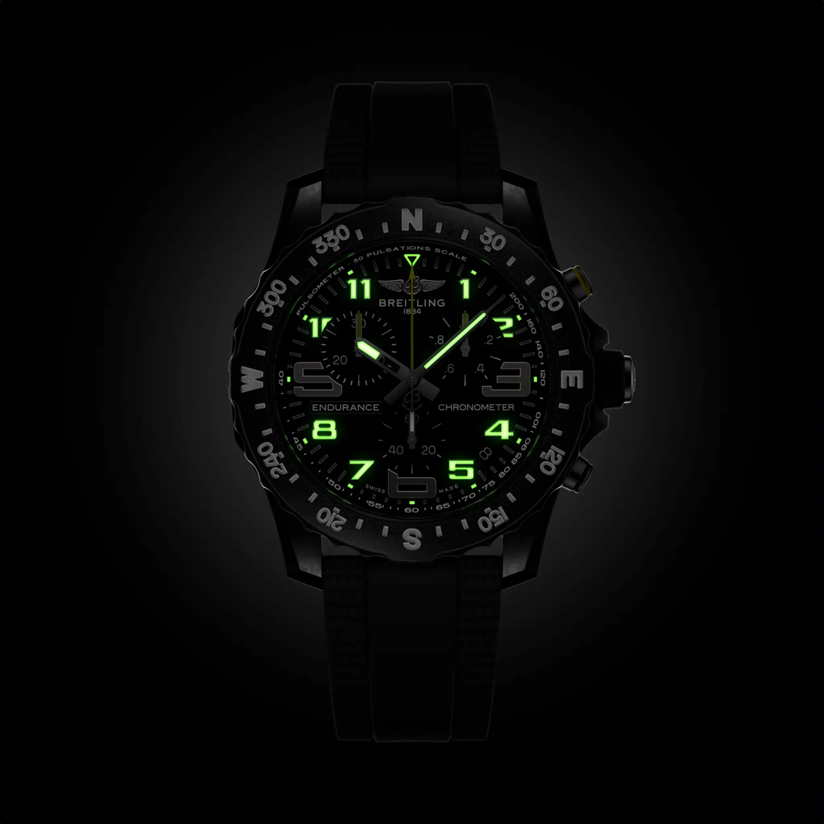 Breitling Endurance Pro chronograph black dial watch worn on wrist with black rubber strap