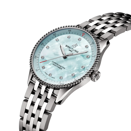 side view of Breitling Navitimer Automatic showing steel case crown and beaded bezel detail