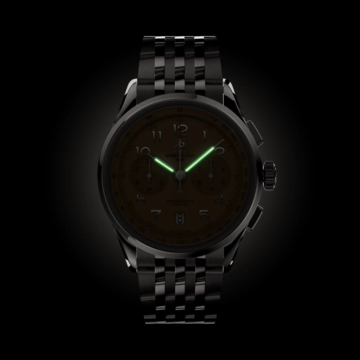 Breitling Premier Chronograph salmon dial watch showing the watching glowing in the dark 

