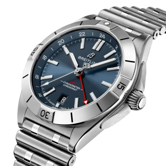 side view of Breitling Chronomat stainless steel case highlighting the rider tab bezel design and crown