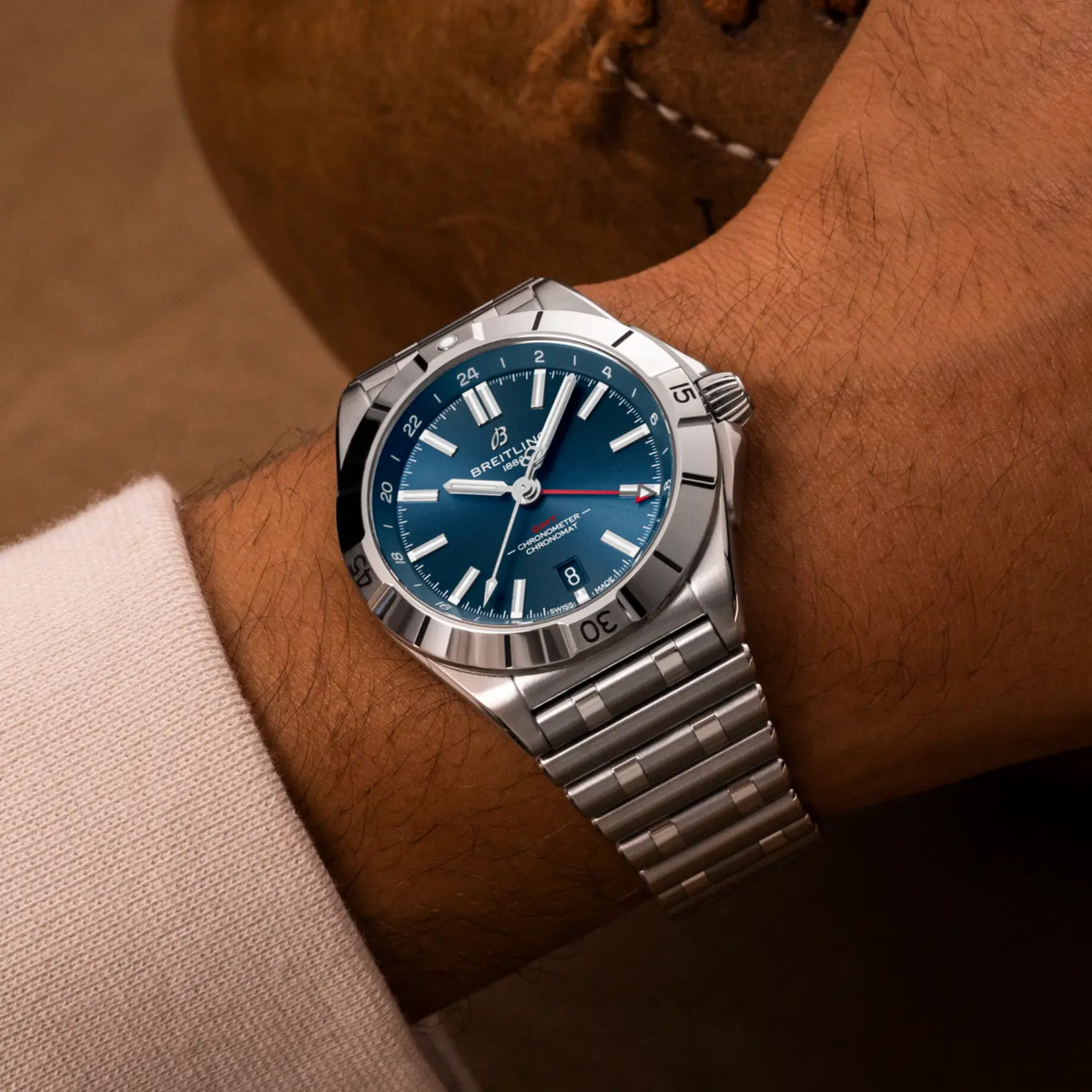 Breitling Chronomat GMT blue dial stainless steel bracelet watch styled on wrist with a versatile, everyday look