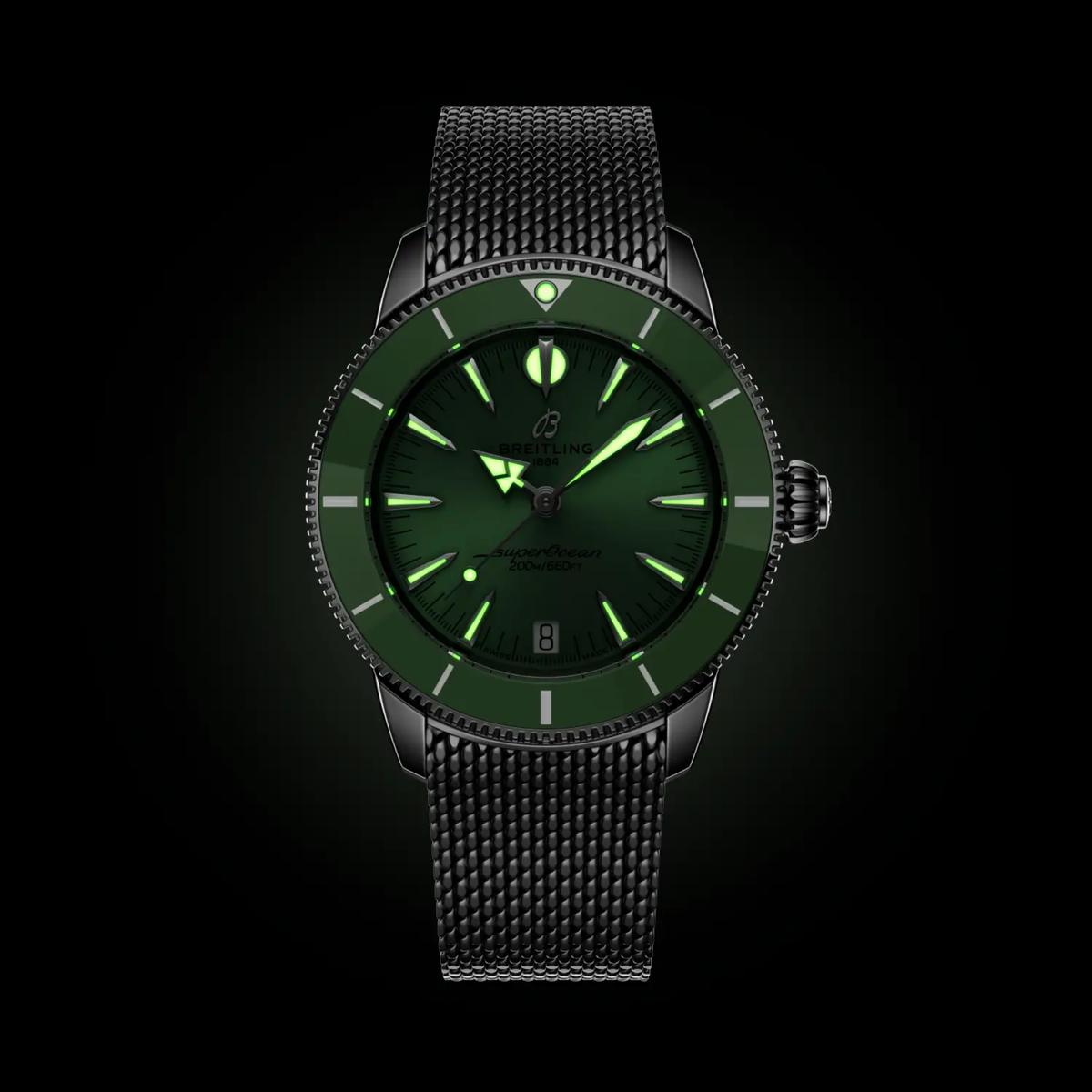 Breitling Superocean green dial watch glowing in the dark with luminous hands and hour markers for enhanced underwater and low-light visibility