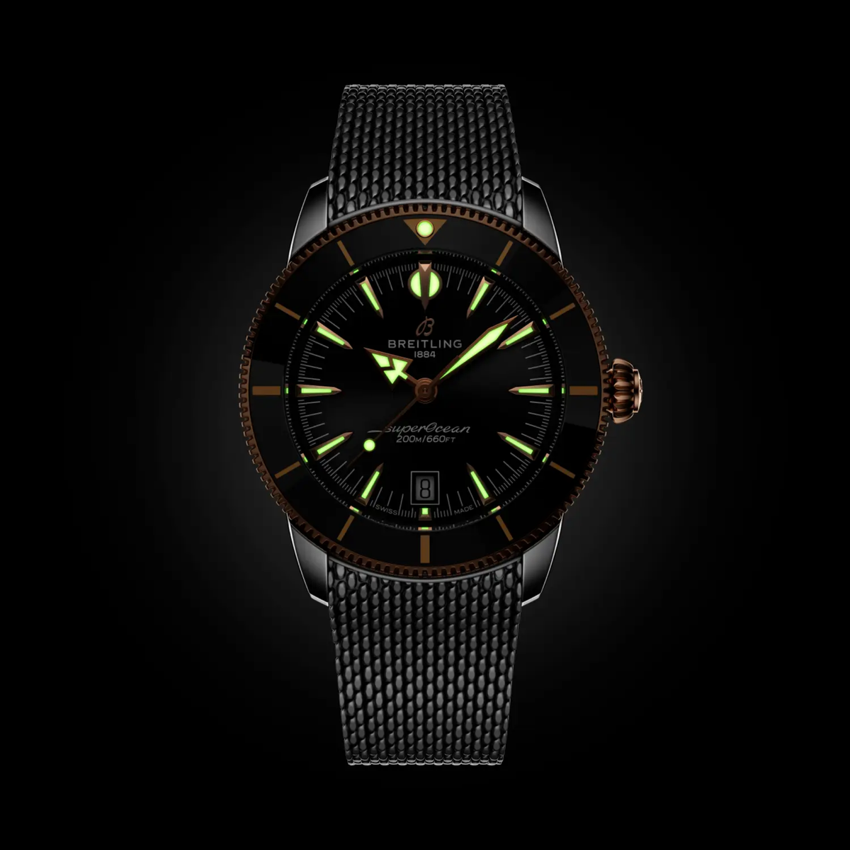 Breitling Superocean Heritage black dial two tone mesh bracelet watch on wrist vintage luxury diver style