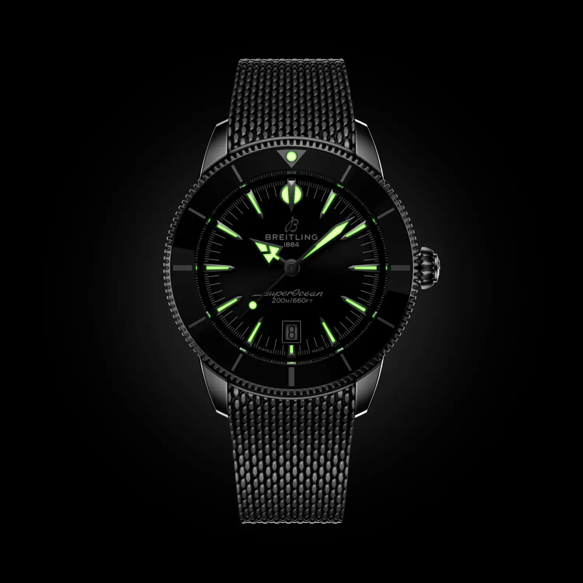 Breitling Superocean Heritage black dial watch glowing in the dark with luminous hands and hour markers illuminated