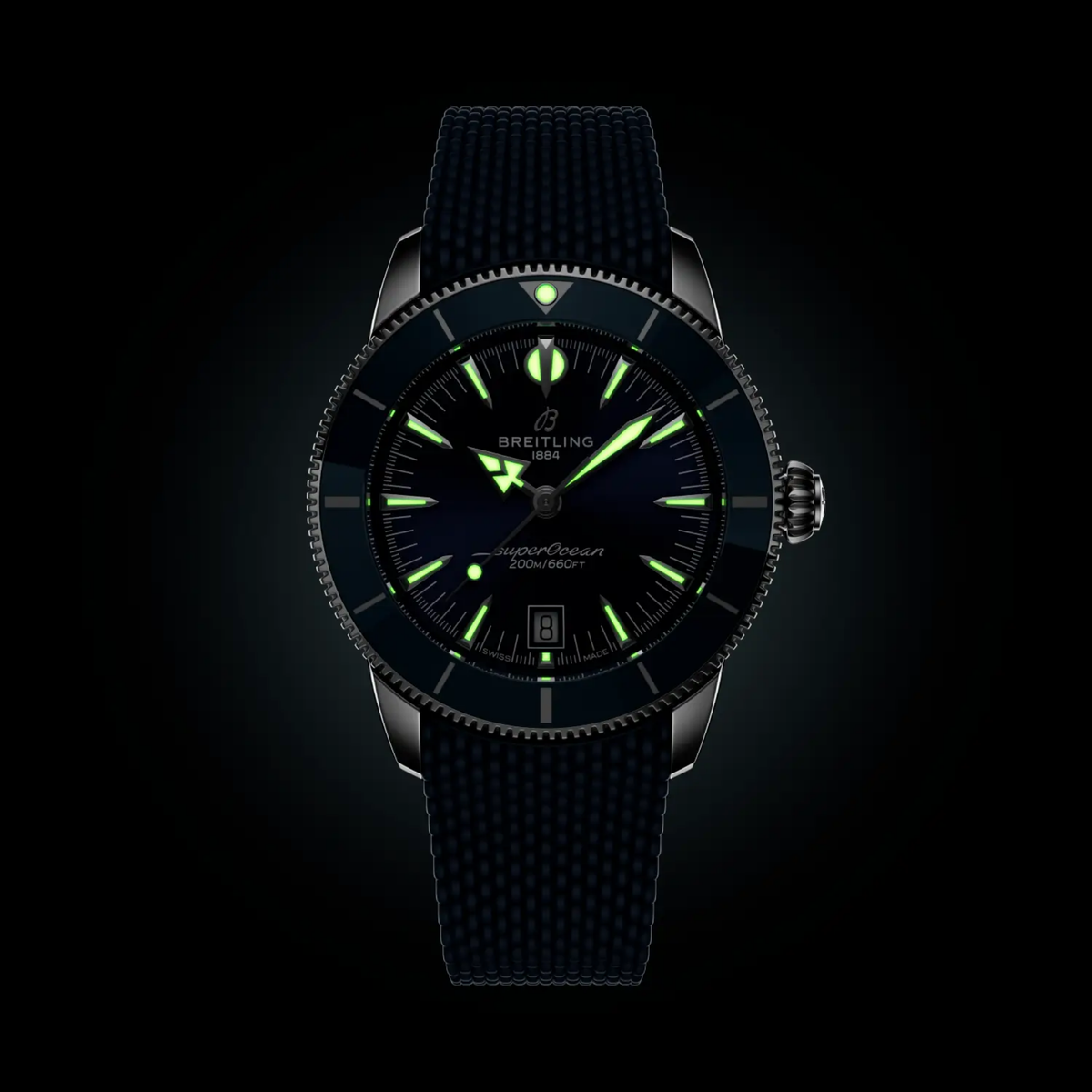 Breitling Superocean Heritage blue dial watch glowing in the dark with luminous hands and hour markers for enhanced visibility
