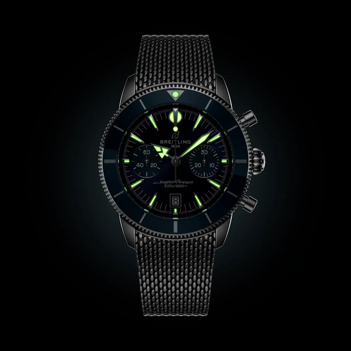 Breitling Superocean Heritage Chronograph blue dial watch glowing in the dark with luminous hands, markers and subdials clearly visible