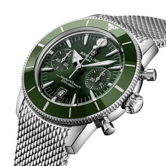 side view of Breitling Superocean Heritage Chronograph stainless steel case with green ceramic bezel and chronograph pushers