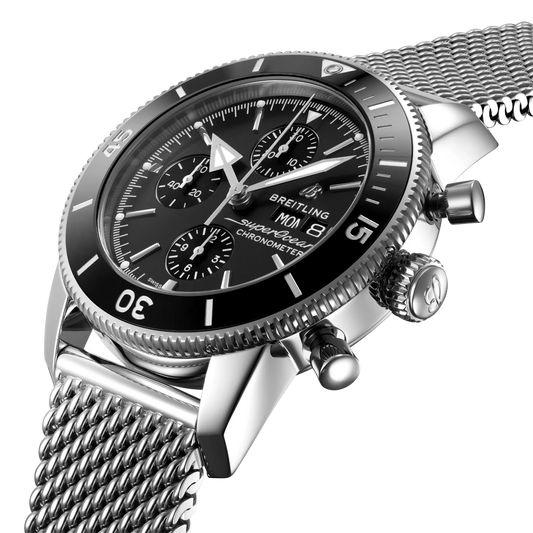 side view of Breitling Superocean Heritage Chronograph stainless steel case with black ceramic bezel and chronograph pushers