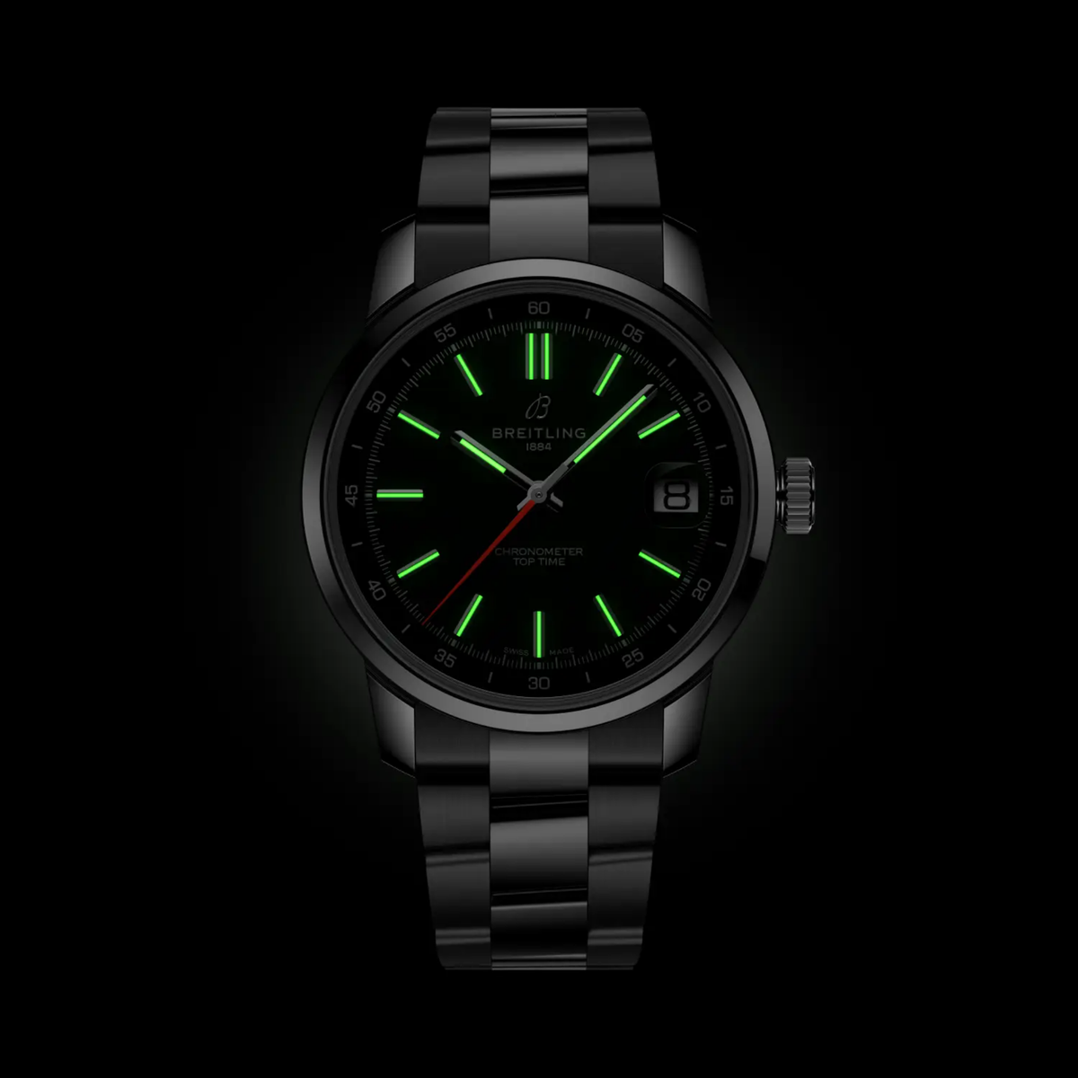 Breitling Top Time green dial watch glowing in the dark with luminous hands and hour markers for clear low-light visibility