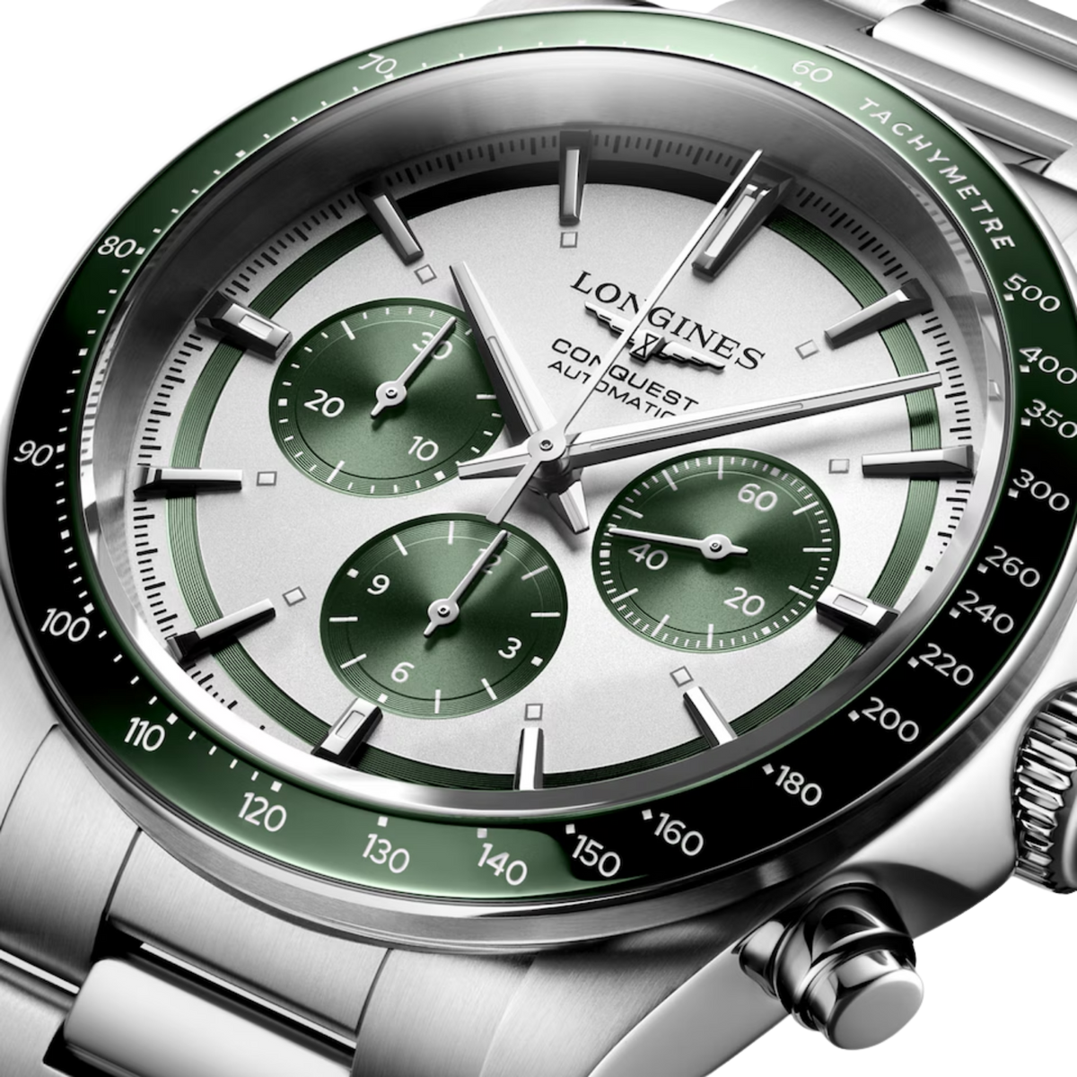 Longines Conquest chronograph watch worn on the wrist featuring a green tachymeter bezel and sporty stainless steel design
