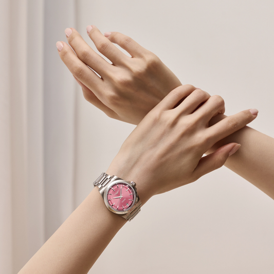 Longines Conquest 34mm pink dial watch featuring Swiss Super-LumiNova®, sapphire crystal and an elegant stainless steel bracelet.