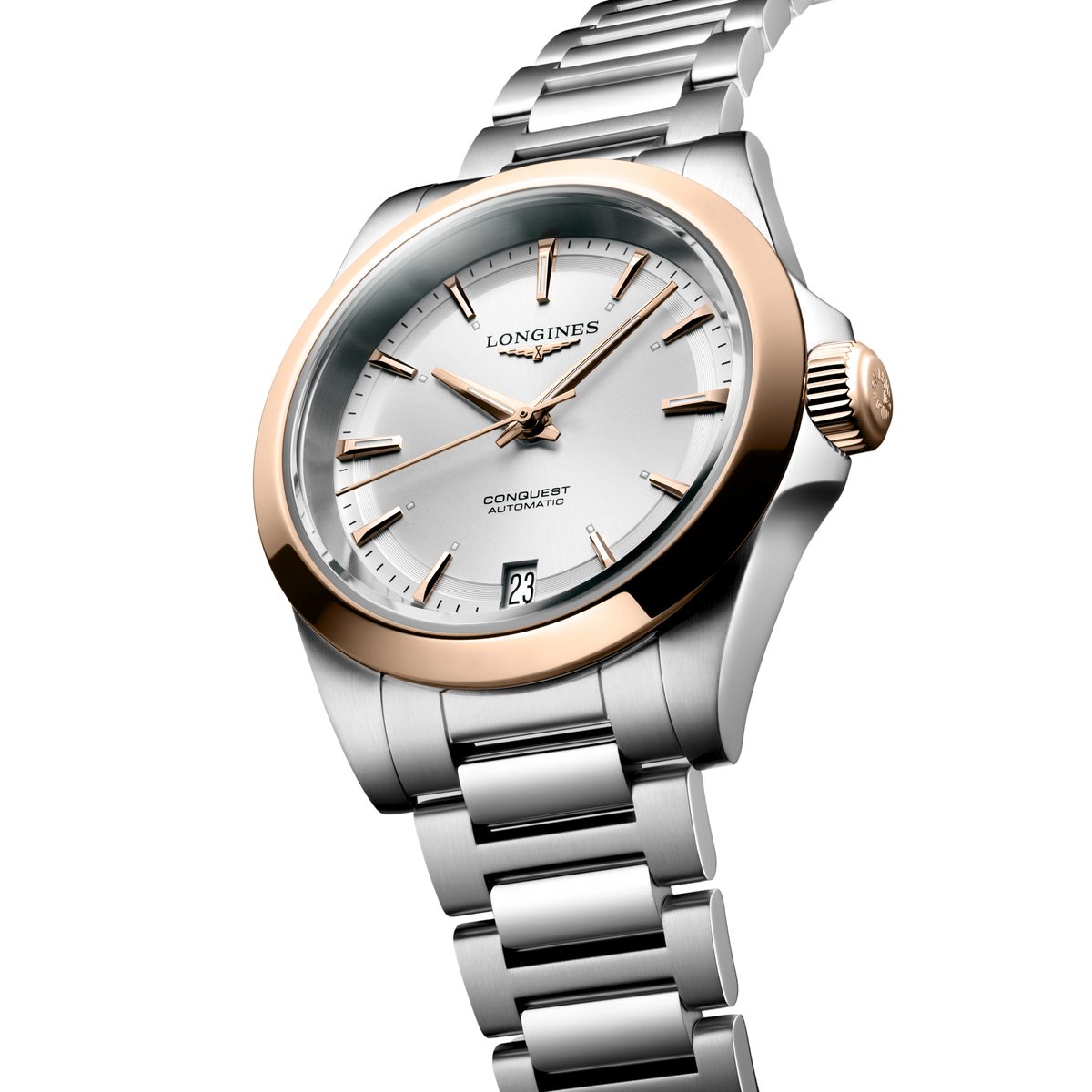 close up of the Longines Conquest silver sunray dial with rose gold hands, hour markers and date window
