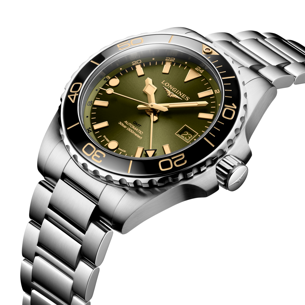 close up of the Longines HydroConquest GMT dial showing luminous hands, GMT scale, date display and green sunray finish
