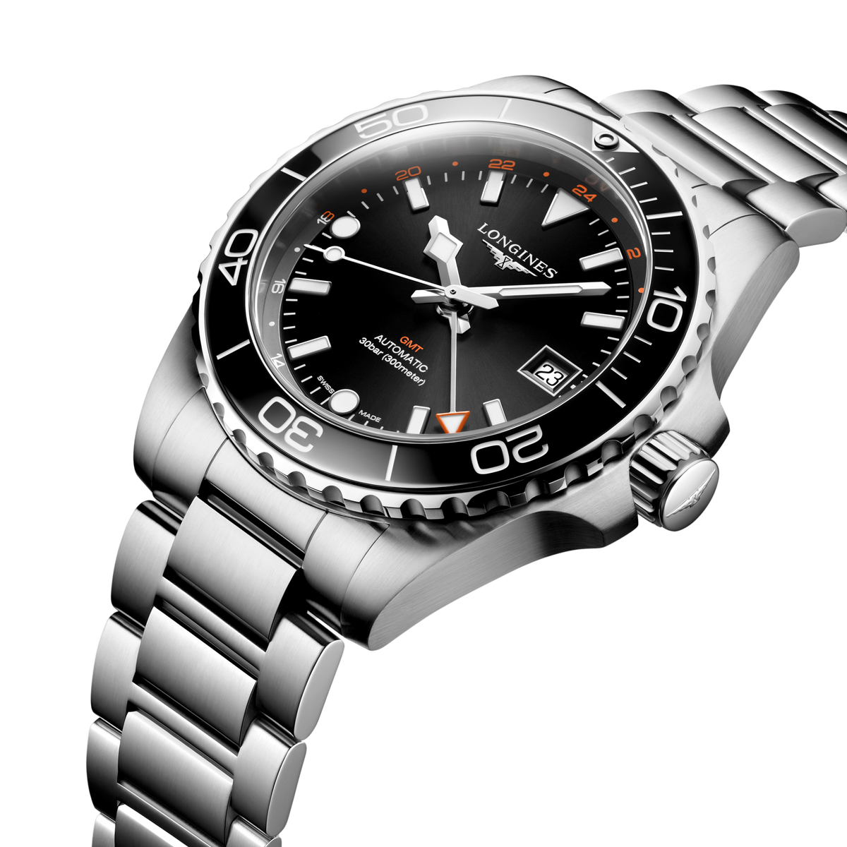close up of the Longines HydroConquest GMT dial showing luminous hands, orange GMT hand, ceramic bezel and date display
