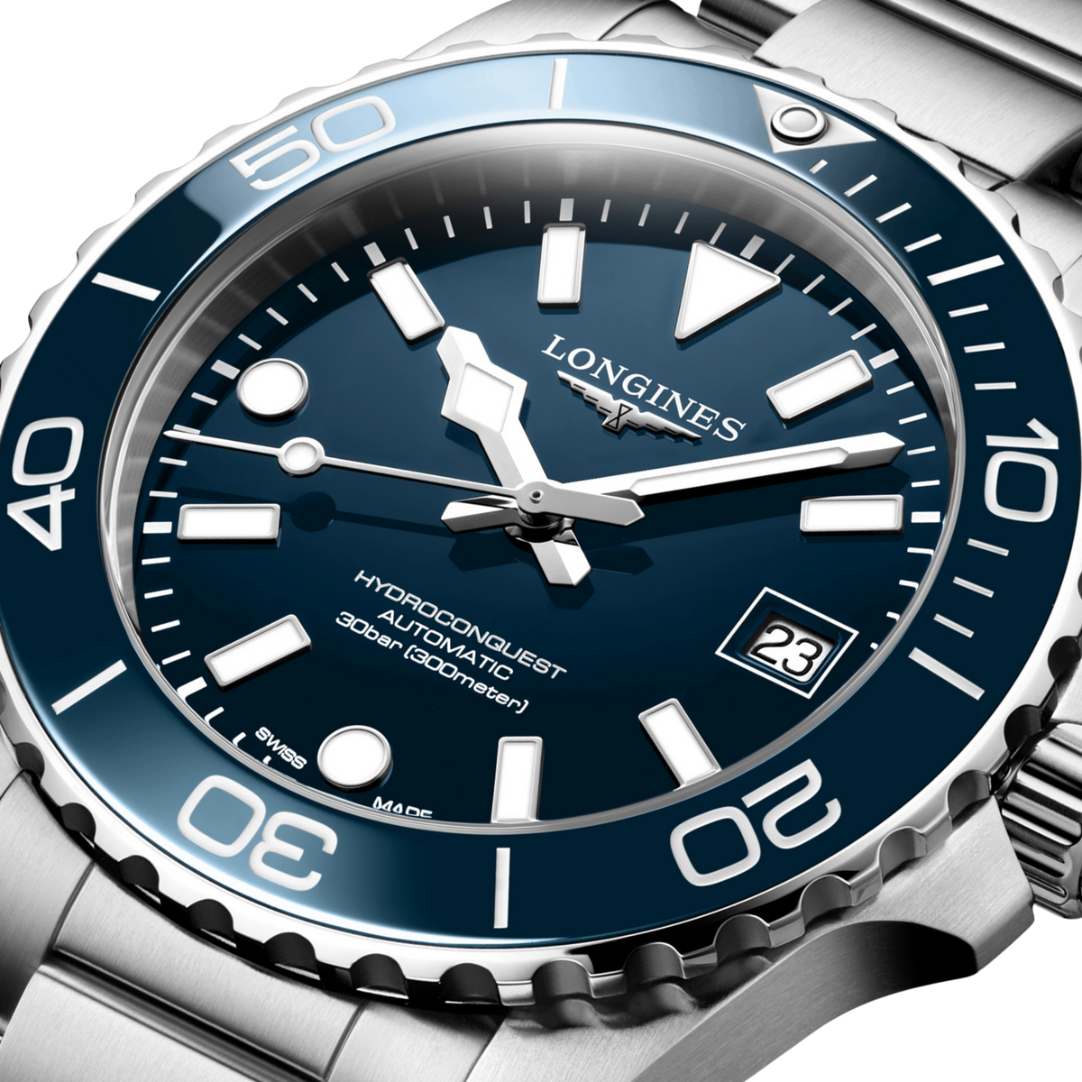 close up of the Longines HydroConquest blue dial with luminous hands, bold dive markers and date window at 3 o’clock
