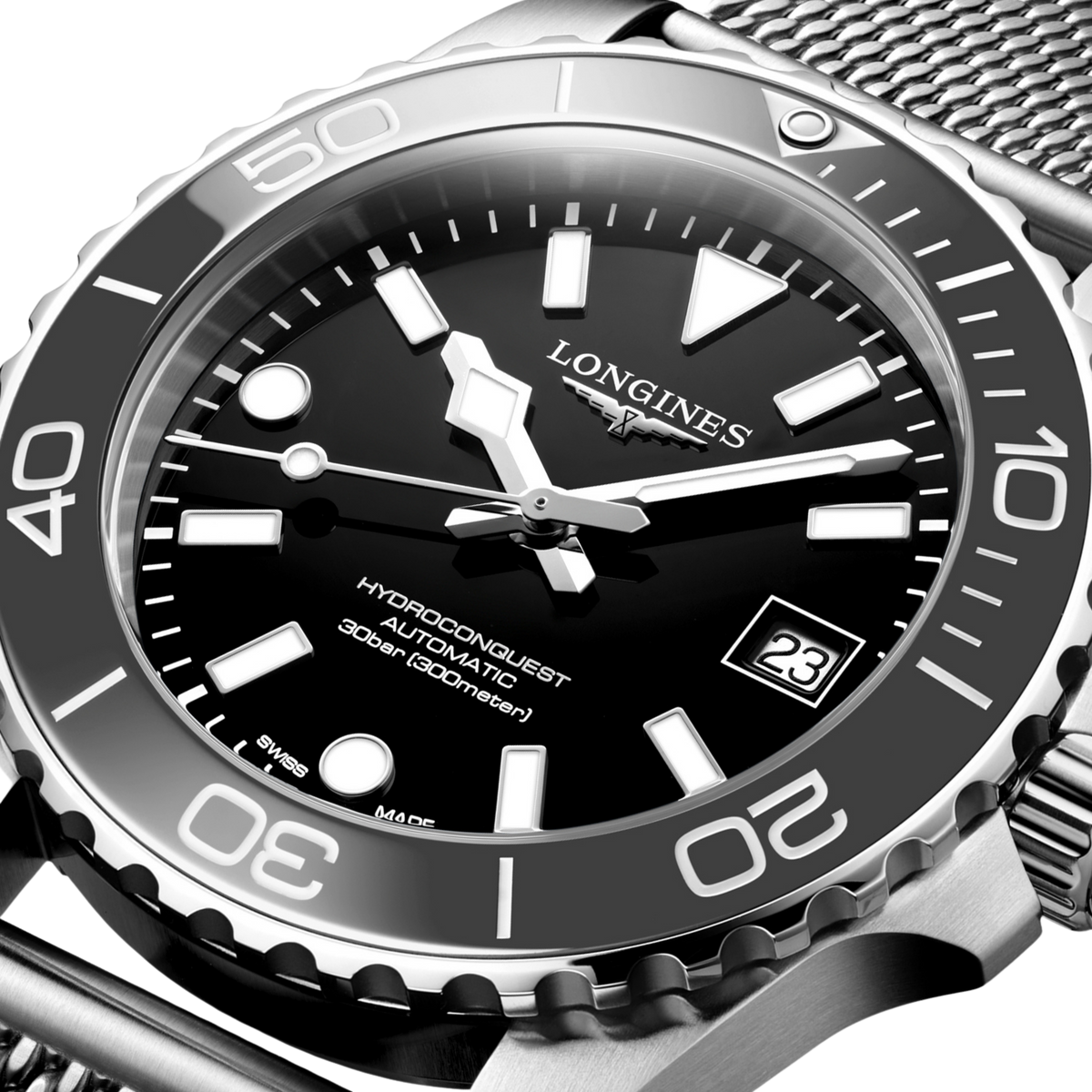 close up of the Longines HydroConquest green sunray dial featuring luminous hands, oversized hour markers and date display
