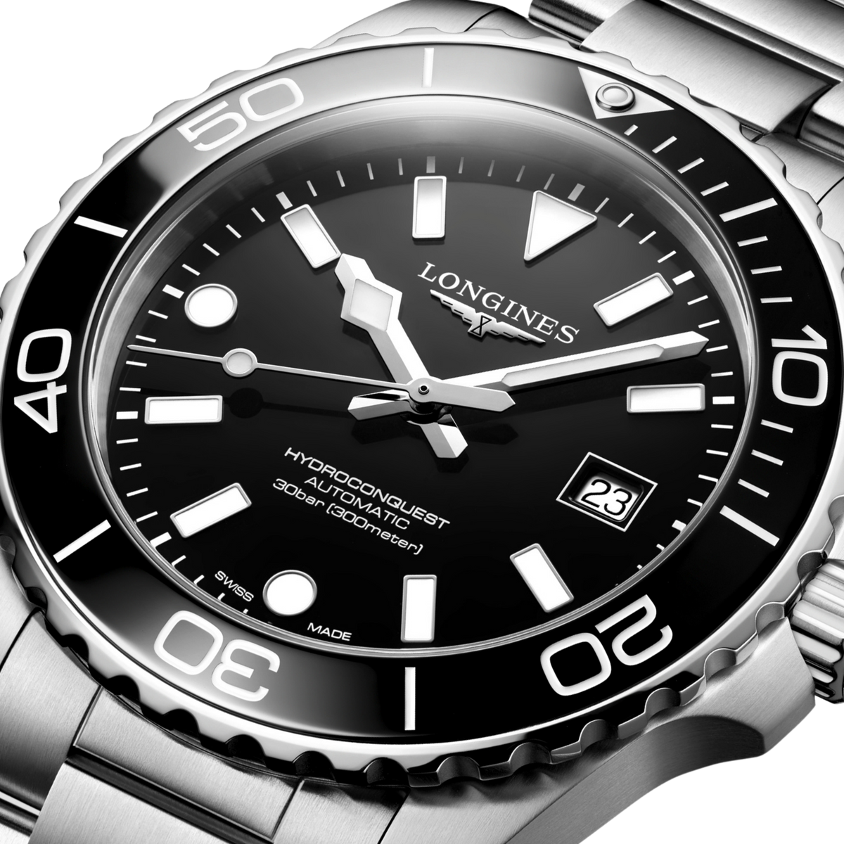 close up of the Longines HydroConquest black dial featuring luminous hour markers, bold hands and date display at 3 o’clock
