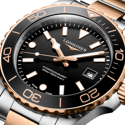 Longines HydroConquest 42mm men’s quartz watch with black dial and red PVD steel bracelet