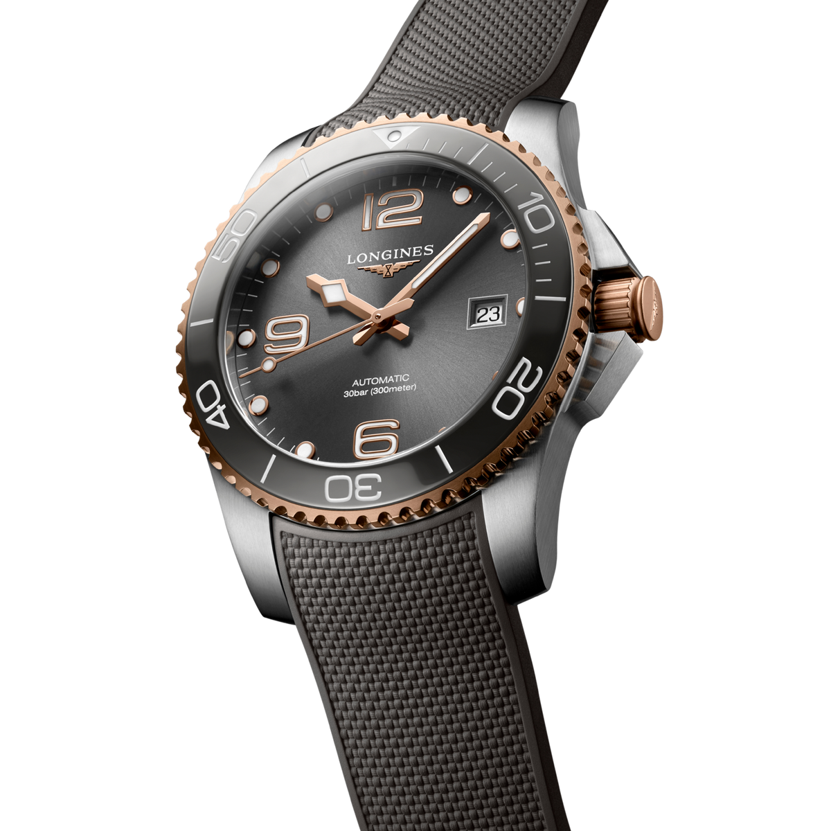 close up of the Longines HydroConquest grey dial featuring luminous markers, rose gold hands and date window at 3 o’clock
