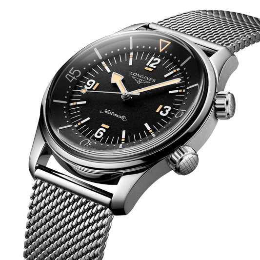 front view of Longines Legend Diver black dial automatic watch with stainless steel mesh bracelet and vintage inspired rotating bezel

