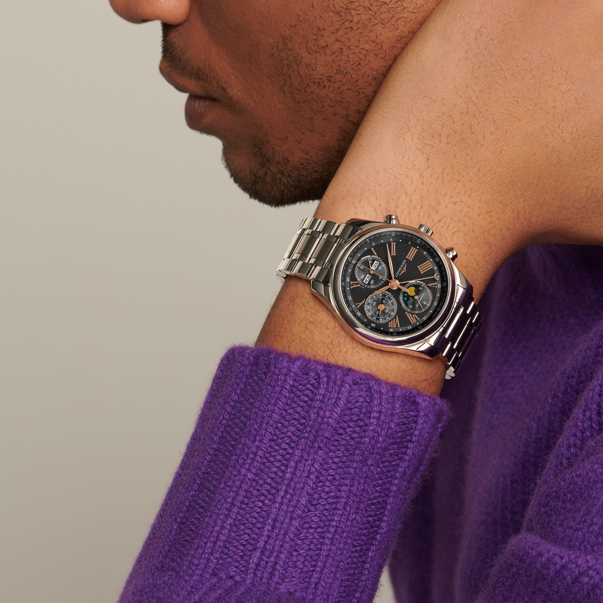 Longines Master Collection moonphase watch worn on the wrist with a stainless steel bracelet and elegant chronograph styling
