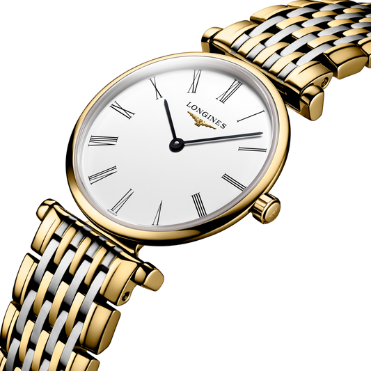Longines La Grande Classique dress watch worn on the wrist with a slim two tone bracelet and minimalist white dial
