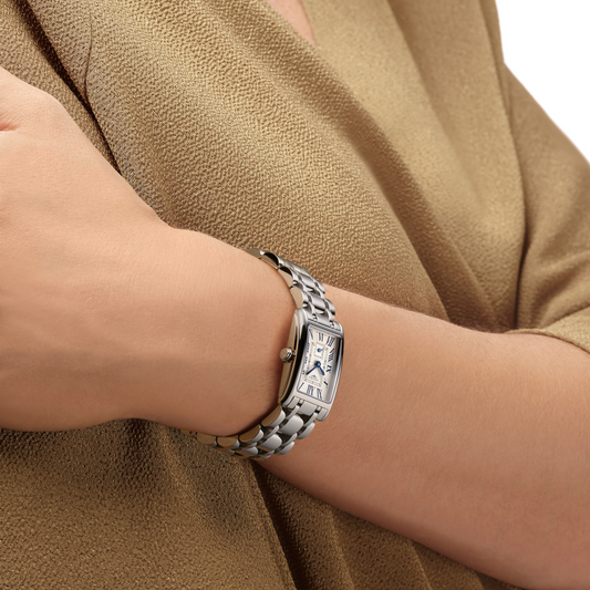 Longines DolceVita stainless steel watch styled on the wrist with an elegant rectangular case and polished bracelet
