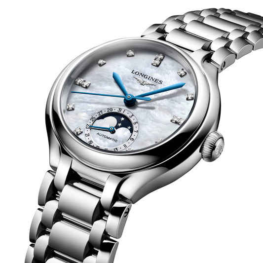 At the heart of the watch is a Swiss automatic movement featuring a moonphase complication, adding a poetic and traditional touch to its classic design. It reflects the precision and heritage associated with Longines.