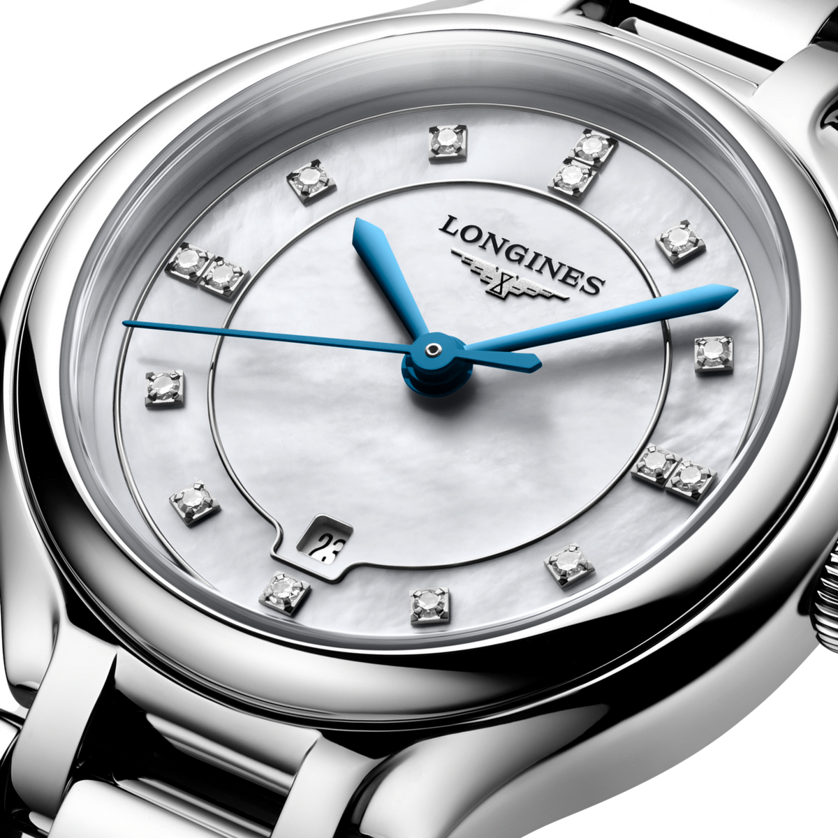 Longines watch with silver case and blue hands on a clear background