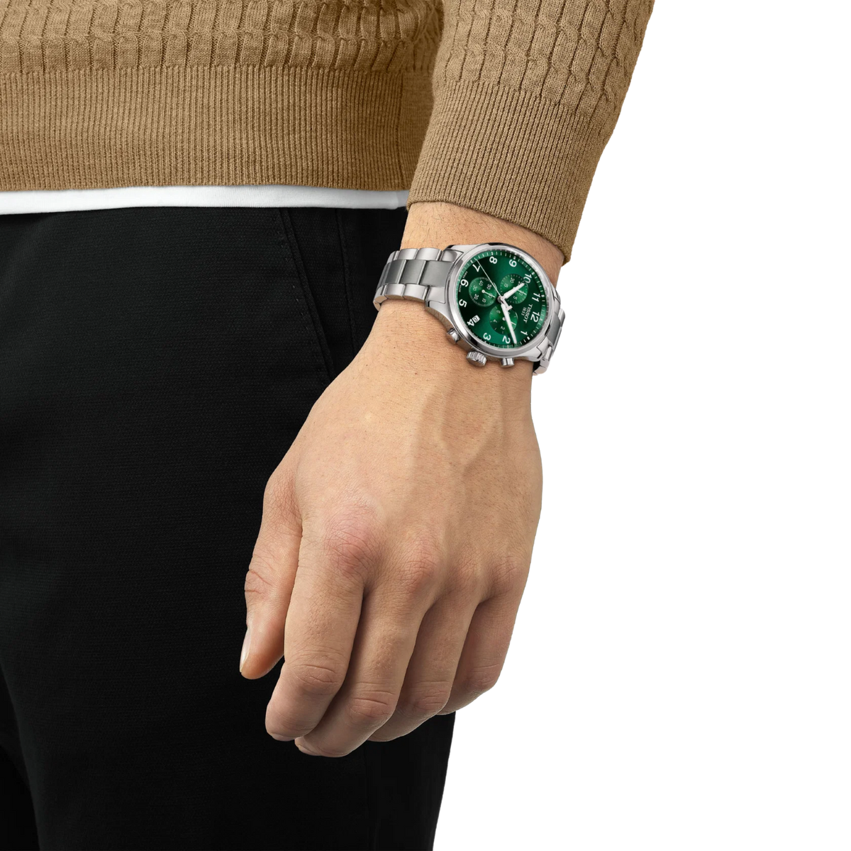 the watch worn on the wrist, showcasing the substantial stainless steel case, chronograph sub-dials, and vibrant green dial suited to everyday wear and casual sporty styling