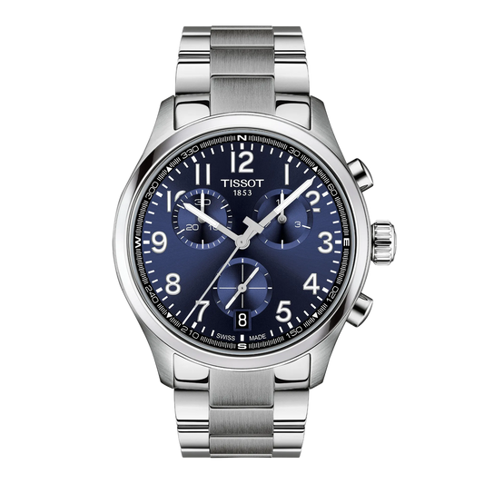 Tissot Chronograph Blue Dial Watch featuring a rich blue dial with matching chronograph sub-dials, bold Arabic numerals, and a brushed stainless steel bracelet for sporty everyday styling