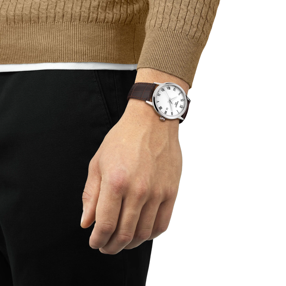 the watch worn on the wrist, showcasing the elegant white dial, slim stainless steel case, and brown crocodile-pattern leather strap suited to formal and everyday styling