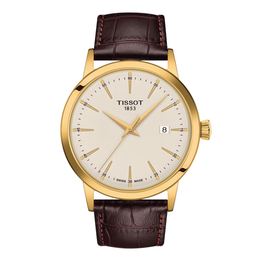Tissot Classic Dream 42mm, featuring a gold PVD-coated stainless steel case, ivory dial, sapphire crystal and Swiss quartz movement.