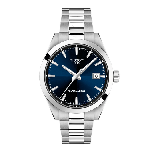 Tissot Powermatic 80 watch with a deep blue sunray dial, polished silver-tone hands and indexes, and a brushed stainless steel bracelet delivering a refined everyday sports-luxury look