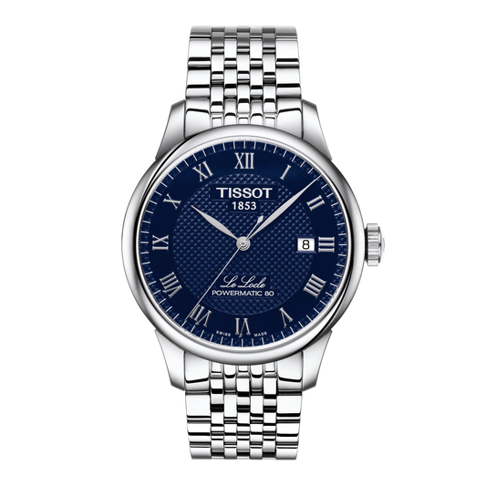 Tissot Le Locle Powermatic 80 Blue Dial Watch with an intricate textured dial, polished Roman numerals, and a stainless steel bracelet that combines classic styling with modern refinement