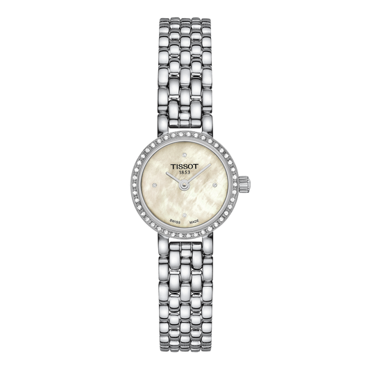 Tissot stainless steel ladies watch featuring a soft mother-of-pearl dial, minimalist diamond hour markers, and a slim case framed by a sparkling diamond-set bezel, paired with an elegant multi-link steel bracelet