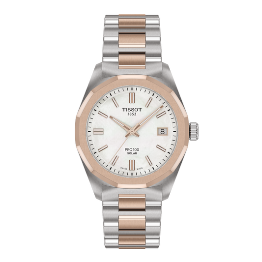 Tissot PRC 100 Solar two-tone watch featuring a silver textured dial with rose gold-tone baton hour markers, a date window at 3 o’clock, and a faceted rose gold-tone bezel paired with a stainless steel and rose gold-tone bracelet