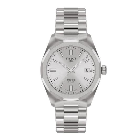 Tissot PRC 100 Solar stainless steel watch featuring a silver textured dial, slim baton hour markers, and a date window at 3 o’clock, paired with a bold integrated-style stainless steel bracelet for a modern, sporty finish