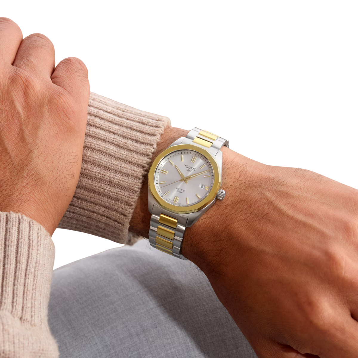 Tissot PRC 100 Solar combining a 39mm stainless steel case with a silver dial, two-tone PVD detailing and innovative Swiss solar quartz movement.