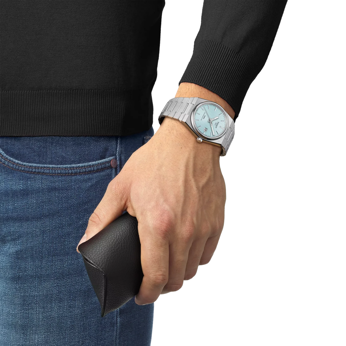 Tissot PRX automatic watch featuring an ice blue dial and integrated stainless steel bracelet.