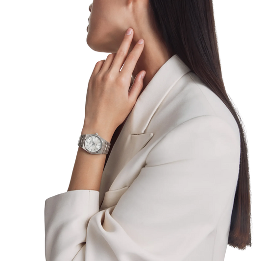 Tissot PRX 35mm Swiss quartz watch with mother-of-pearl dial.