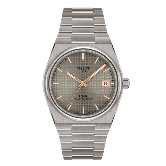 Tissot PRX Powermatic 80 titanium watch with a grey waffle dial, rose gold-tone markers, and integrated bracelet.