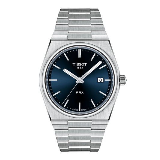 Tissot PRX Blue Gradient Dial Watch featuring a deep blue sunray-effect dial, integrated stainless steel bracelet, and clean retro-inspired styling with a sleek modern finish