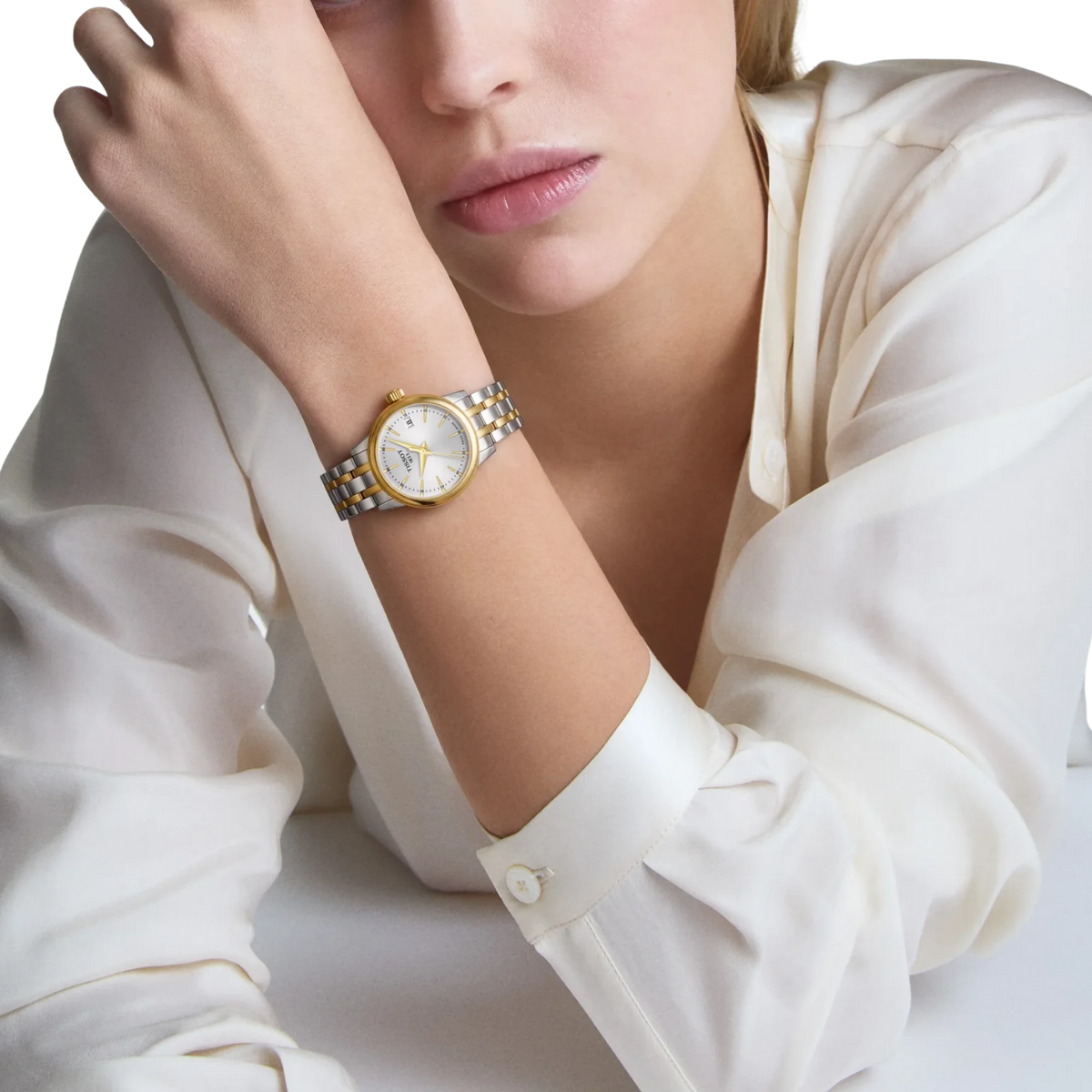 Tissot Classic Dream Lady Swiss quartz watch with silver dial.