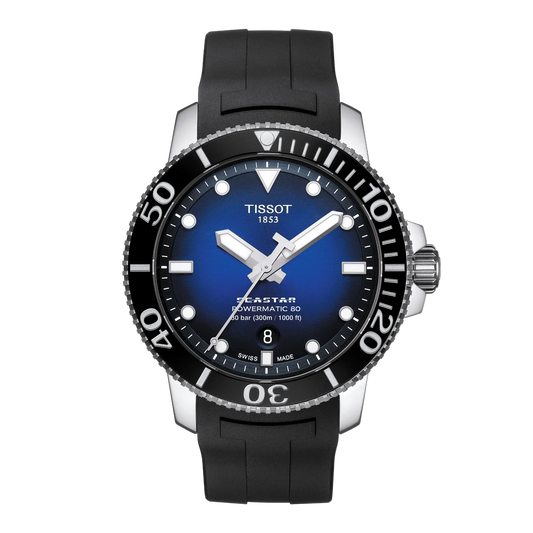 Tissot Seastar Blue Dial Watch featuring a bold gradient blue dial, black unidirectional diving bezel, and durable black rubber strap designed for sporty everyday and underwater performance