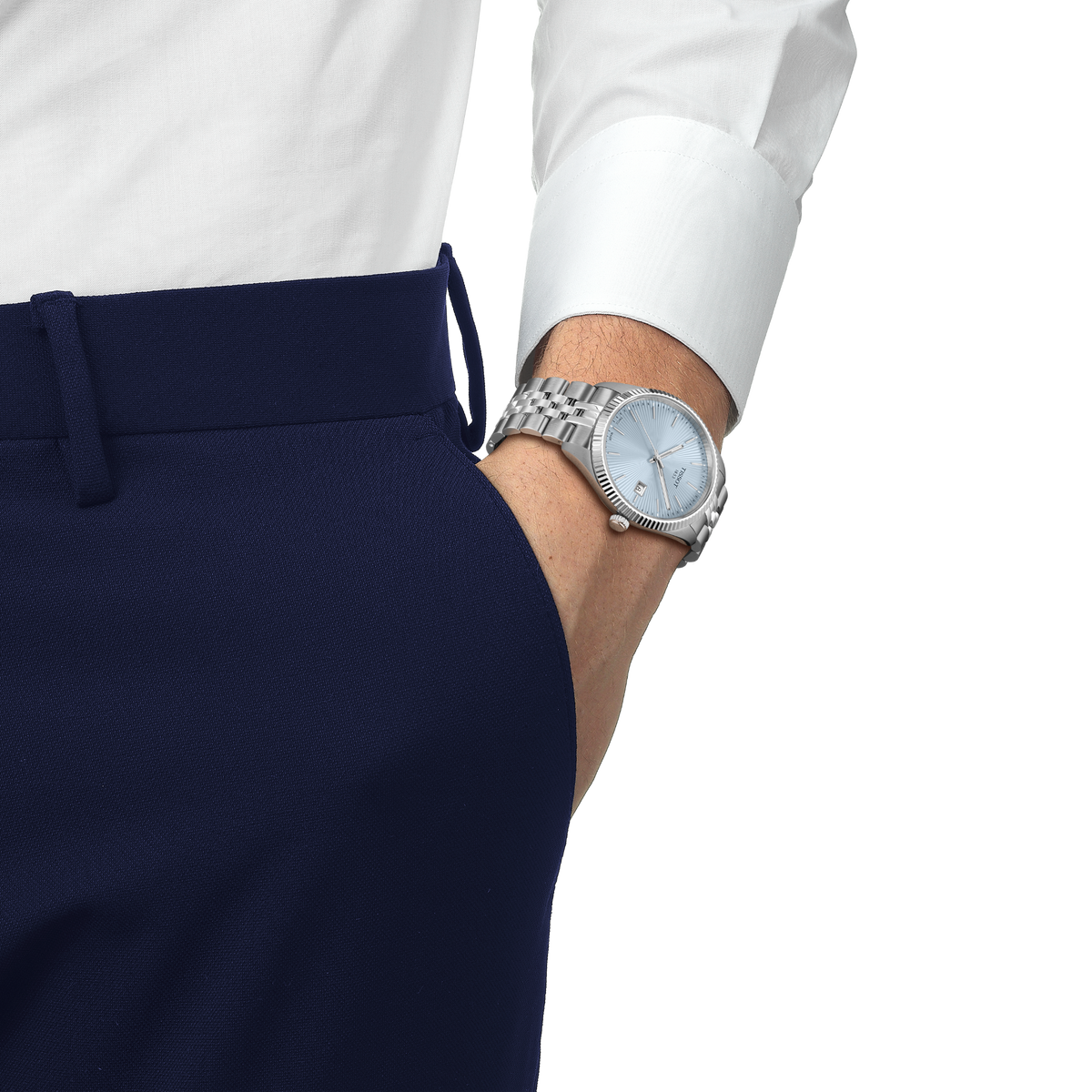 the watch worn on the wrist, showcasing its clean proportions, light-catching dial, and how the bracelet sits comfortably for everyday wear