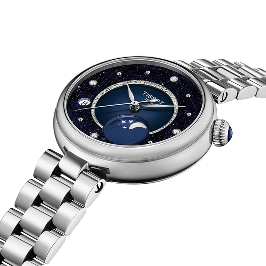 Elegant Tissot Désir ladies' watch featuring a blue dial and diamond hour markers.